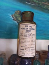 CARL A. SCHMIDT antica bottiglia in ferro e clorato di potassio ambra