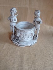 Porcellana capodimonte. Putti