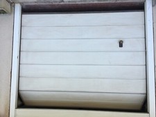 Portone sezionale garage motorizzato in alluminio