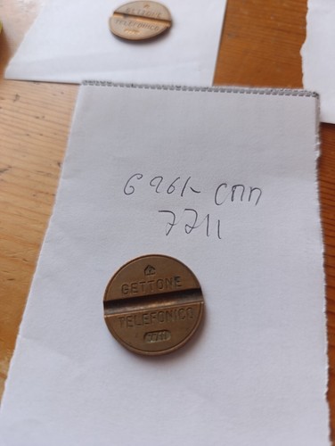 Gettone telefonico 7711 cmm - gettone,