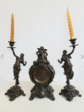 Trittico  composto da Orologio