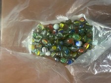 Lotto di 80 biglie in vetro