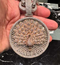 Ciondolo uomo pavone