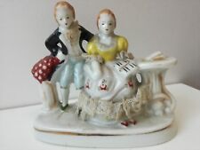 Splendida statuina in ceramica