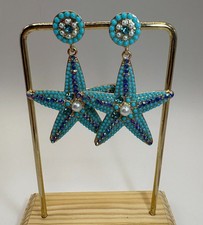 Orecchini stella marina rigidi