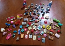 Collezione gomme 60 Pezzi,più 17 Pezzi Puffi In Gomma,In Ottime Condizioni