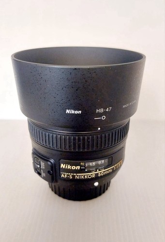 Nikon 50mm 1 - f/1.8, g