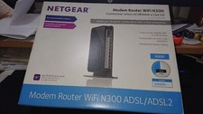 NETGEAR DGN2200v4 N300 Wireless ADSL+ Modem Router