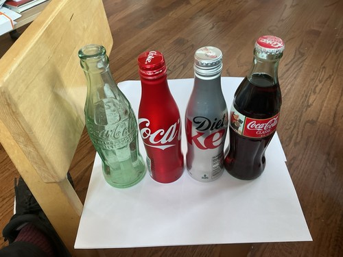 Set four coke bottles - four,