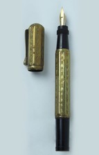 PENNA STILOGRAFICA LAMINATA PENNINO RIENTRANTE, 1920 ca. Pennino oro. Funzionant