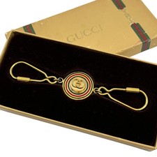 Portachiavi Gucci tono oro con