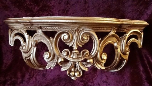 Scaffale consolle parete oro