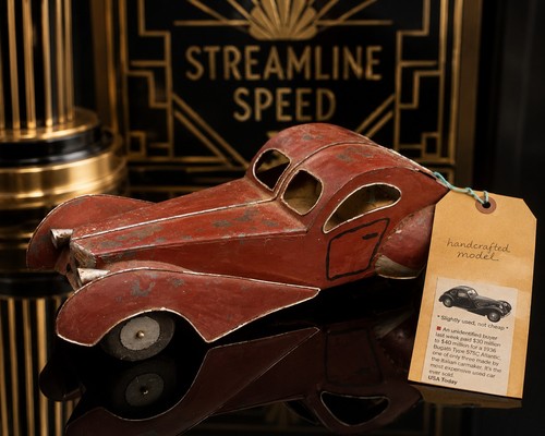 Scultura auto corsa - da,