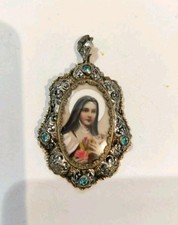 Antica spilla con miniatura