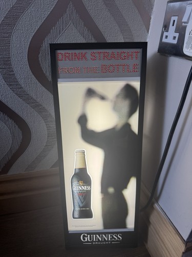 Advertising guinness sign - guinness,