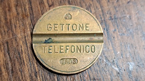 Gettone telefonico 7803 - 7803, cmm