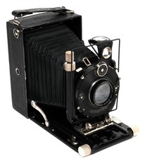 Macchina fotografica - @,