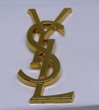 Grand pin's Yves Saint Laurent broche logo doré YSL