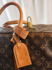 Autentica borsa da viaggio Louis Vuitton LV Sirius 50 marrone monogramma etichetta Poignet Lock