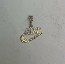 Ciondolo NIKE vintage in oro