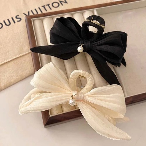 Accessorio per capelli con