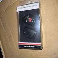 Coprichiave in carbonio per