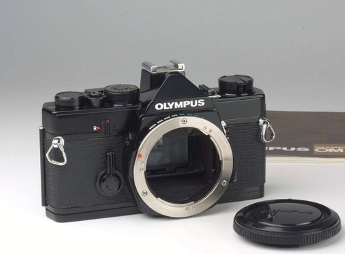 Olympus nero - om-1,