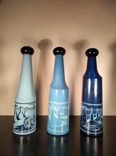 TRIS BOTTIGLIE SALVADOR DALI' PER ROSSO ANTICO, ANNI 70