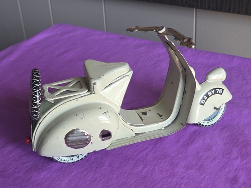 Scooter giocattolo latta