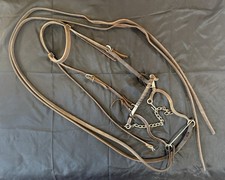 Briglia completa con hackamore meccanico, poggiatesta, redini divise imbracatura pelle