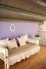Divano letto in ferro battuto  Fiocco bianco decorato oro