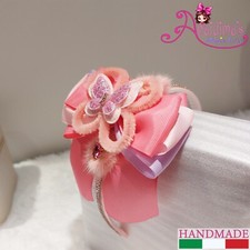 Cerchietto rosa per capelli a