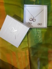 Collana e orecchini donna simbolo infinito