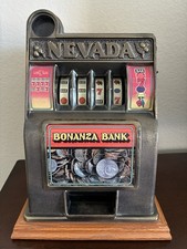 Banco giocattolo slot machine Bonanza con bordo in legno vintage. Funziona!