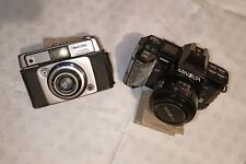 Lotto MINOLTA 7000 AF Obiettivo AF 50mm + Dacora Dignette obiettivo Cassar 45