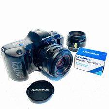 Olympus OM101 Power Focus + entrambi gli obiettivi e adattatore manuale - ottimo e funzionante