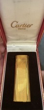 accendino cartier oro