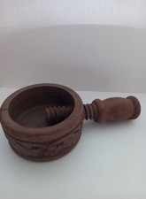 Antico schiaccianoci in legno a vite intarsiato