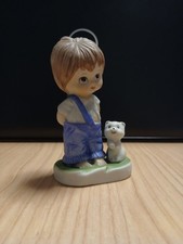 bambino con gatto ceramica