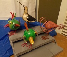 Scultura uccellino in metallo