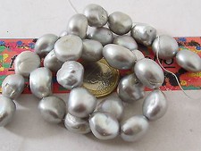 PERLA 1 filo di perle semi grezze irregolari australiane grigie 9x8 mm.