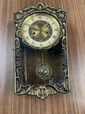 orologio da parete a pendolo