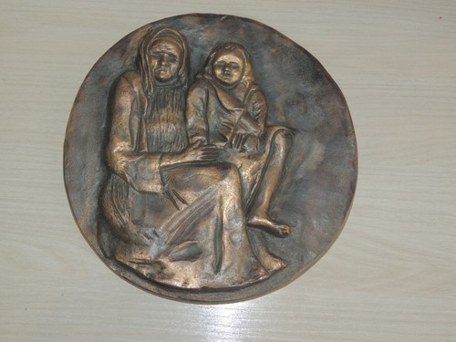 Scultura placca bronzo - in,