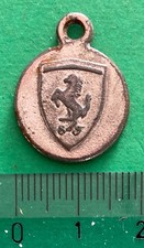 Ciondolo in metallo FERRARI e SHELL diametro 1,8