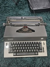 Olympia Report de Luxe