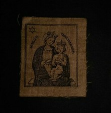 Piccolo santino antico in tela