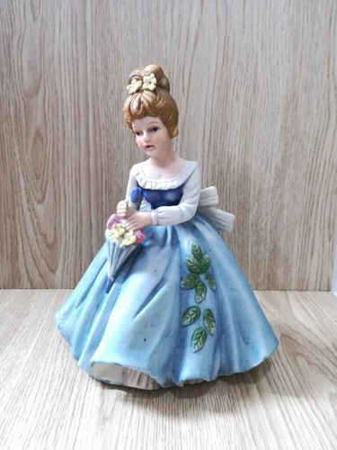 Statuina porcellana damina