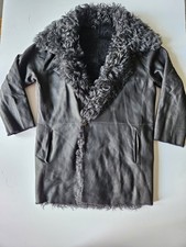 Cappotto in shearling nero