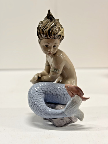Nao lladro come - nao, in