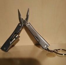 UTENSILE MULTIUSO OUTDOOR ACCESSORI MILITARIA CON FOLDER